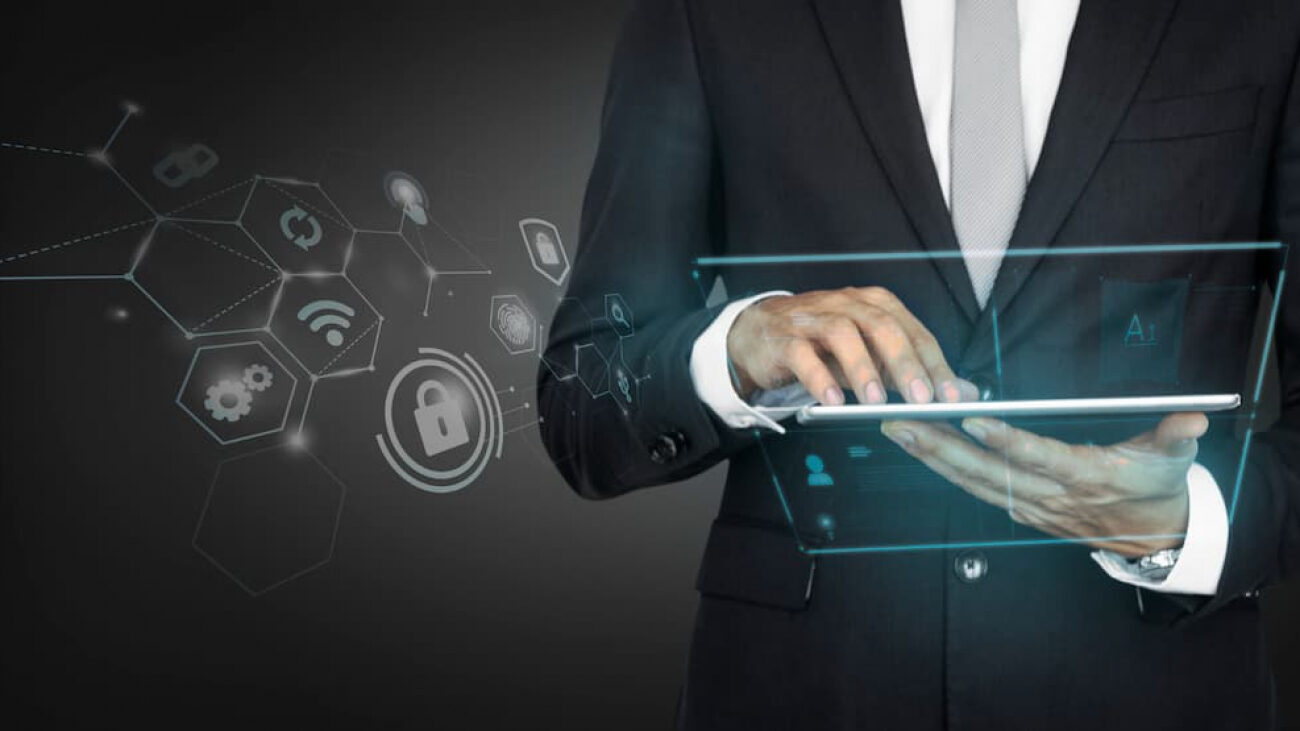 businessman-using-digital-tablet-1-1300×731